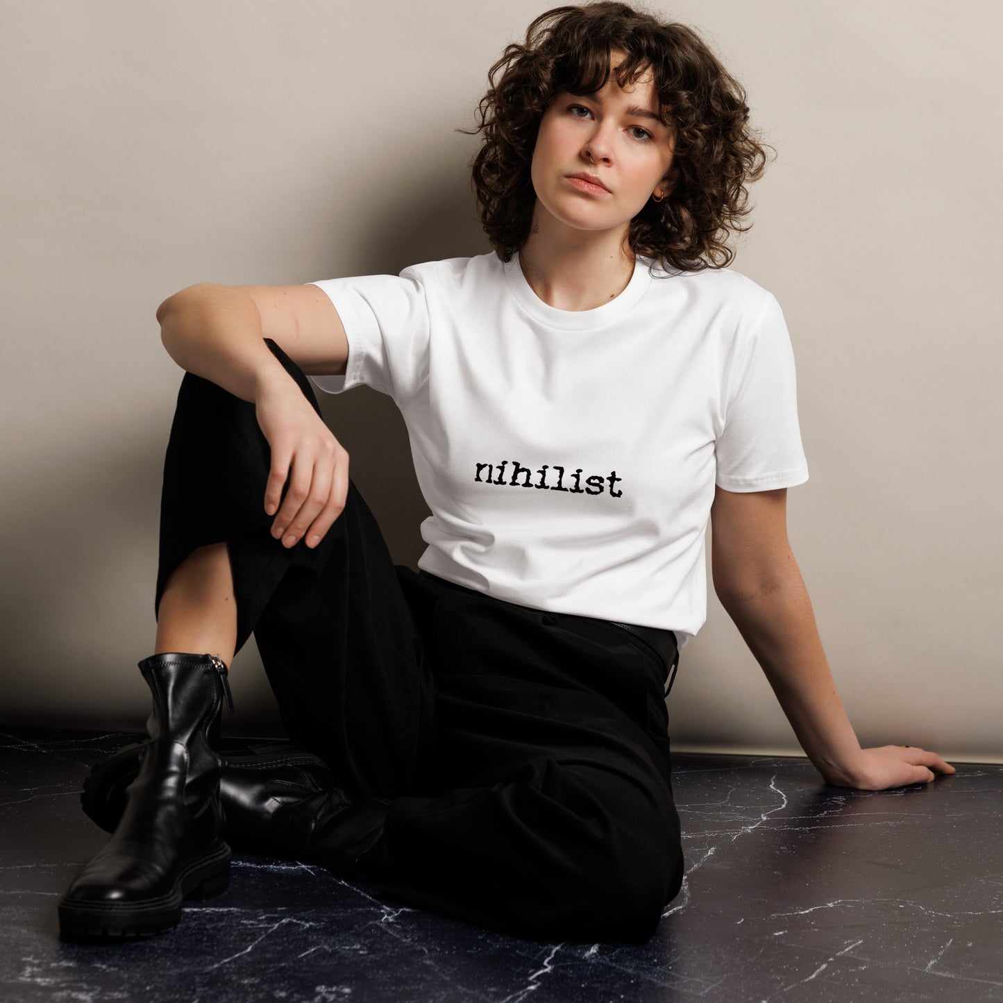 Unisex white Nihilist premium T-shirt from Wayward.biz, front view showing simple minimalist design on soft fabric.