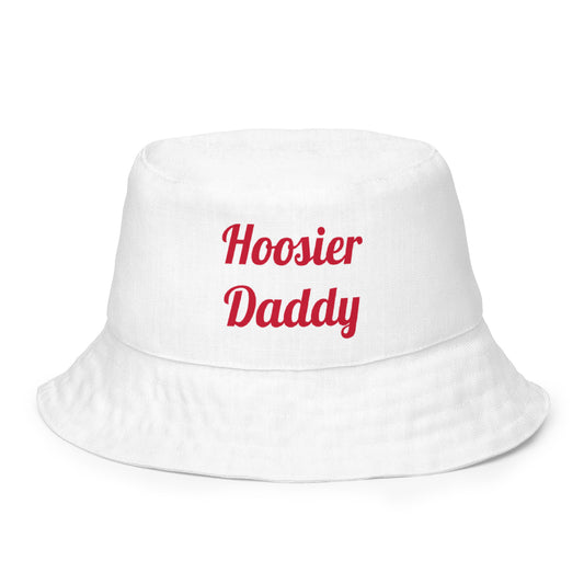 Reversible bucket hat by wayward.biz featuring all-over print, white exterior, and casual sun protection style.