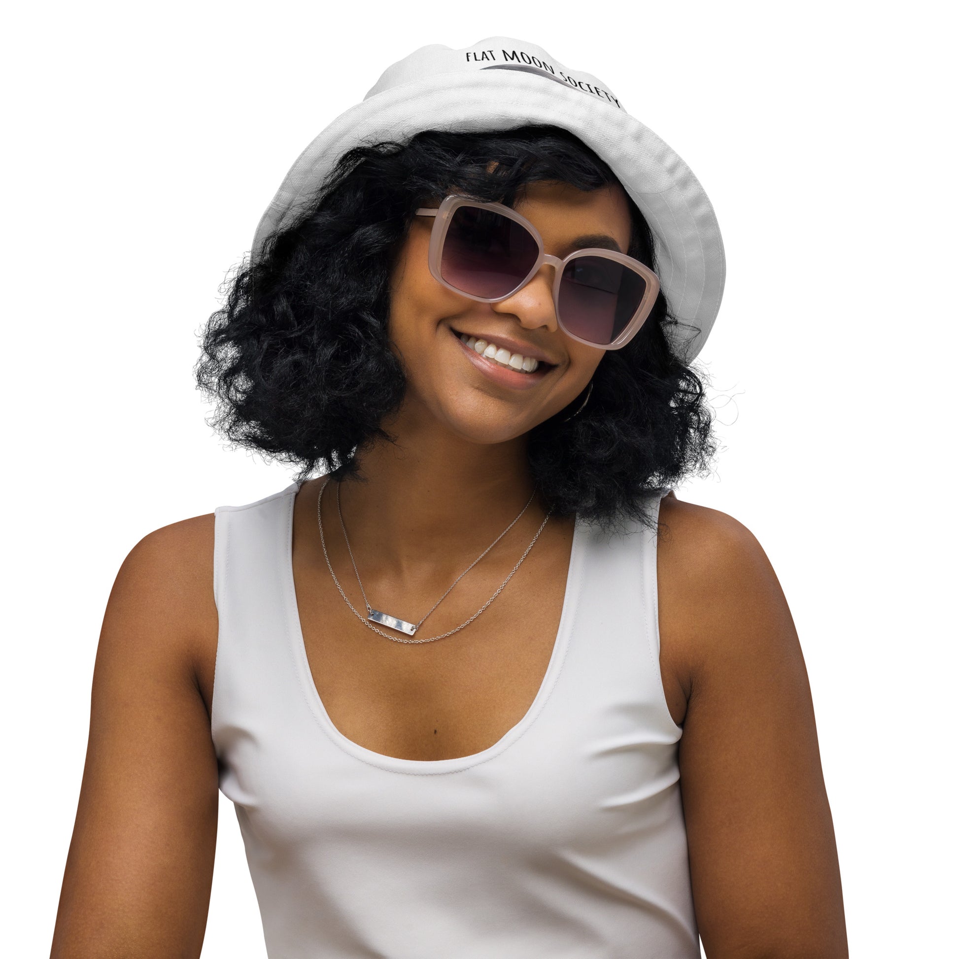 Reversible white bucket hat by Flat Moon Society featuring an all-over print, perfect for casual outdoor wear.