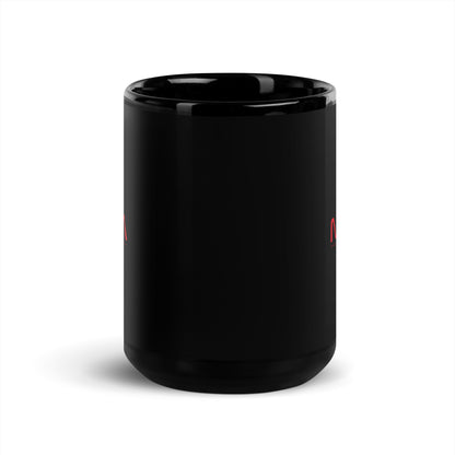 Black glossy 15 oz NADA mug from wayward.biz with a front view showing its shiny surface and large capacity.