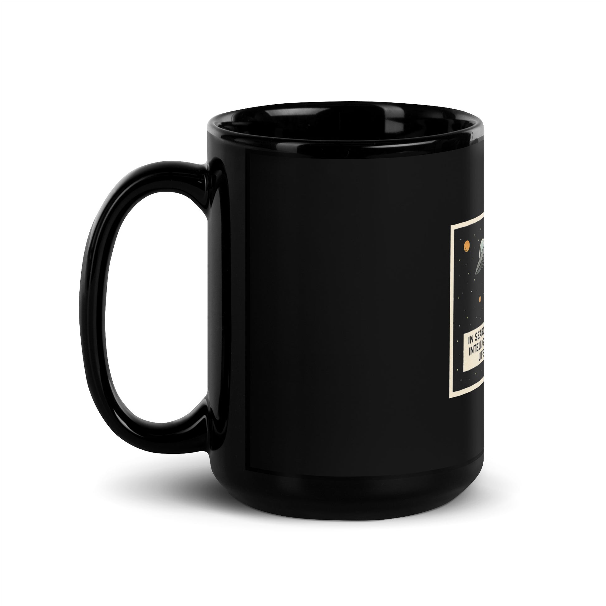 Black glossy 15 oz mug with handle on the left, featuring the "In Search of Intelligent / Opinionated Life" design.