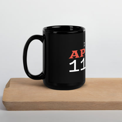 Black glossy 15 oz mug with handle on the left, featuring "I Give Apathy 110%" text, ideal for coffee or tea.