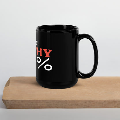 Black glossy 15 oz mug with handle on the right, featuring "I Give Apathy 110%" text, from wayward.biz.