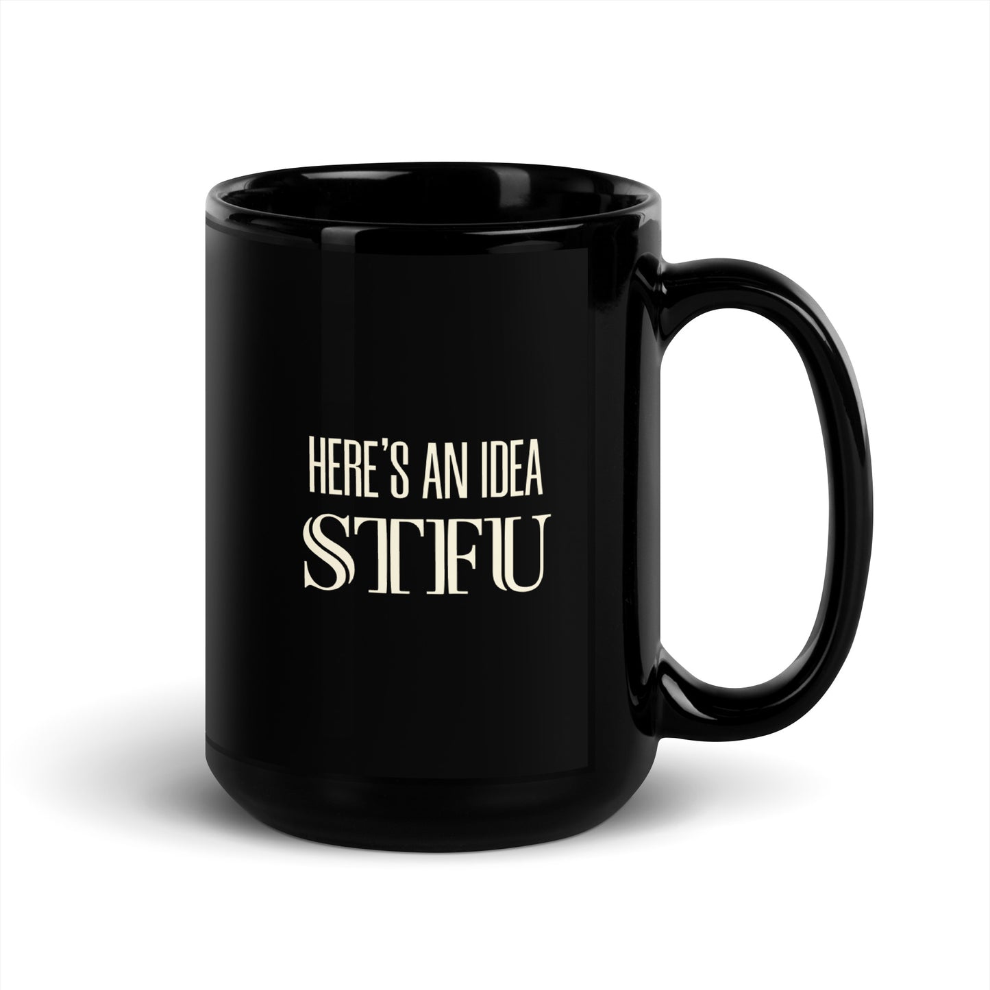 Black glossy "Here's an Idea - STFU" ceramic mug with a handle on the right, 15 oz capacity, by wayward.biz.