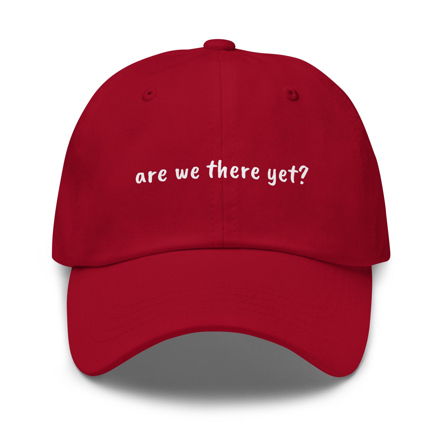 Wayward.biz "Are We There Yet" dad hat in classic cranberry color, front view showing adjustable strap and embroidered design.