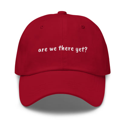 Wayward.biz "Are We There Yet" dad hat in classic cranberry color, front view showing adjustable strap and embroidered design.