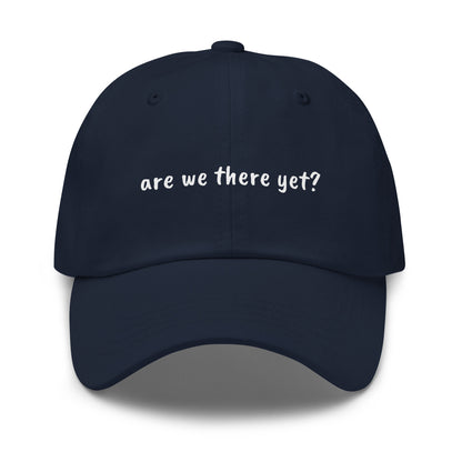 Navy classic dad hat with "Are We There Yet" text, Wayward.biz brand, front view showing adjustable strap and curved brim.