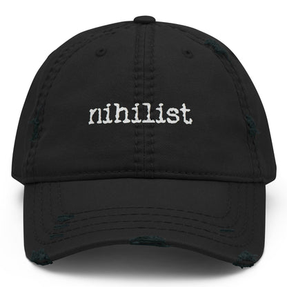 Black nihilist distressed Dad Hat with front logo, casual style, and adjustable strap from wayward.biz.