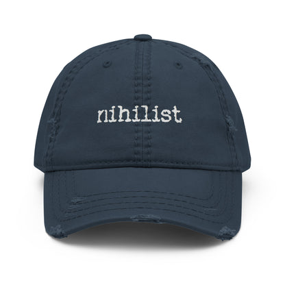 Navy distressed Dad Hat by wayward.biz with a curved brim and worn-in, casual style, showcasing a relaxed, vintage look.