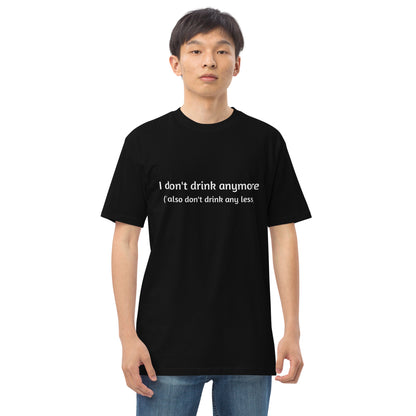 Black men's premium heavyweight T-shirt with "I don't drink anymore (or less)" text, featuring a comfortable fit and classic style.