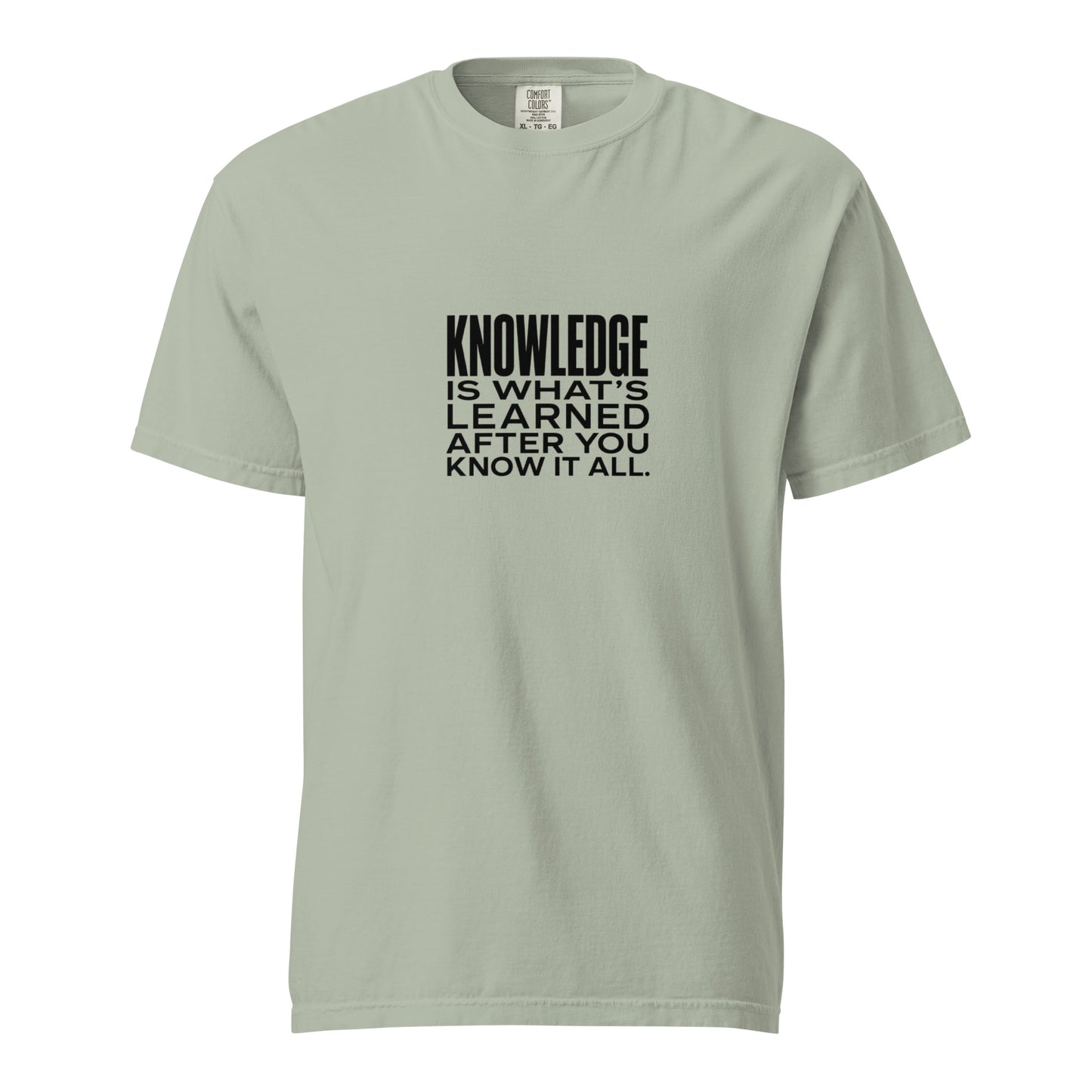 Unisex garment-dyed heavyweight T-shirt with "Knowledge is what's learned after you know it all" print, in a bay color.