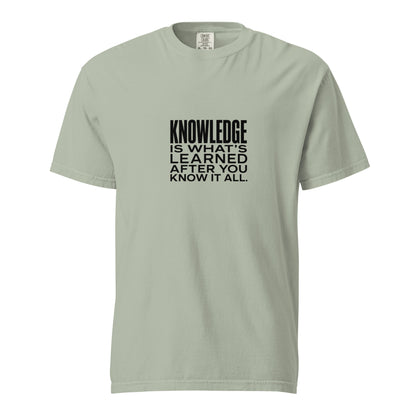 Unisex garment-dyed heavyweight T-shirt with "Knowledge is what's learned after you know it all" print, in a bay color.