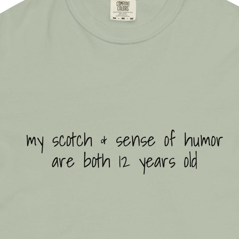 Unisex garment-dyed heavyweight T-shirt with bay front design, 12 years old Scotch and sense of humor print, by wayward.biz