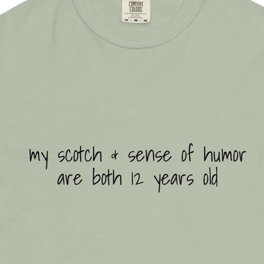 Unisex garment-dyed heavyweight T-shirt with bay front design, 12 years old Scotch and sense of humor print, by wayward.biz