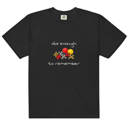 Unisex black heavyweight garment-dyed T-shirt with "Old enough to remember" print, by Wayward.biz, front view.