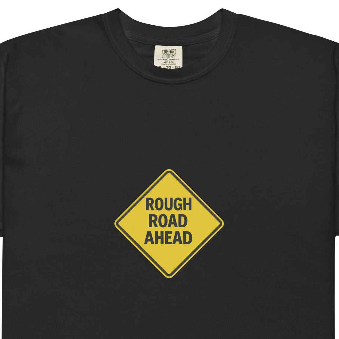 Unisex black garment-dyed heavyweight T-shirt with "Rough Road Ahead" design from wayward.biz, front view.