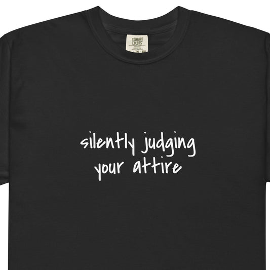 Unisex black garment-dyed heavyweight T-shirt with a relaxed fit, featuring a simple front design, from wayward.biz.