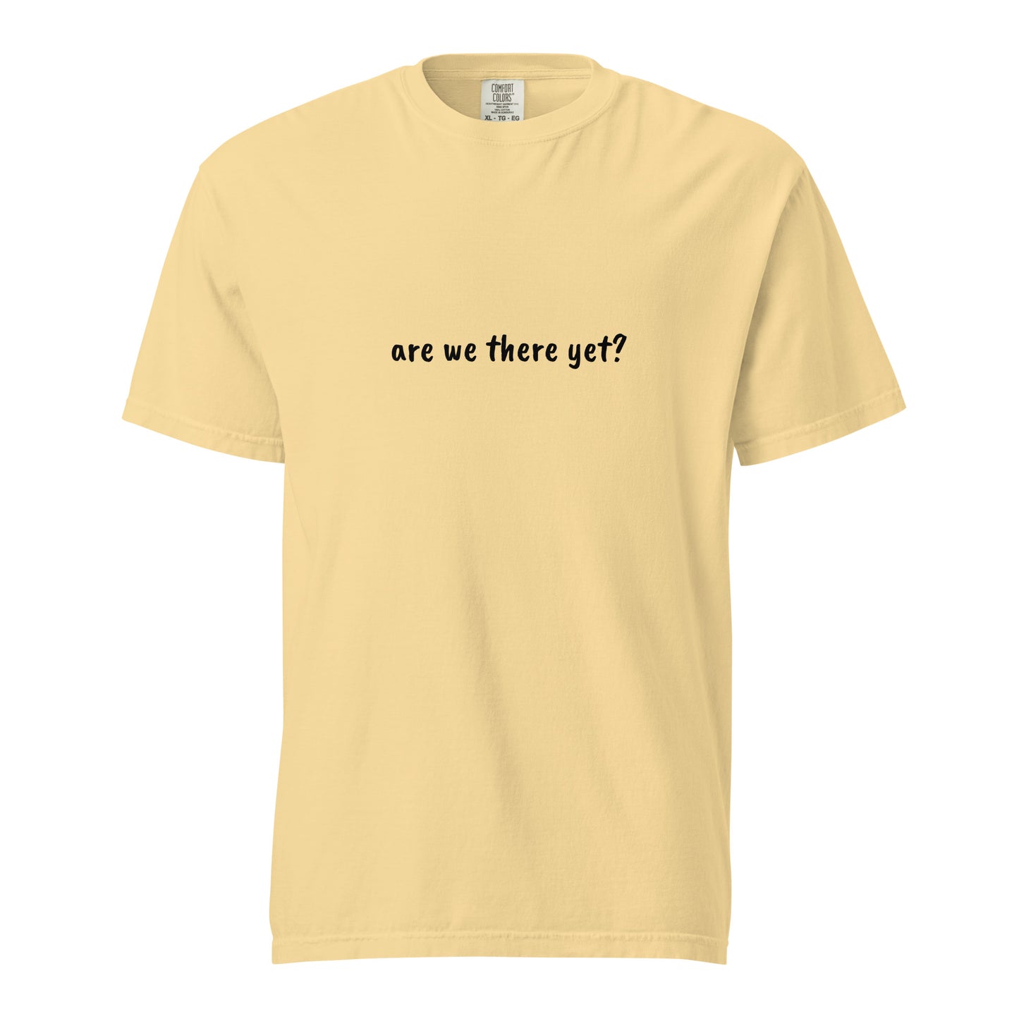 Unisex garment-dyed heavyweight T-shirt in light butter color, featuring a classic crew neck and relaxed fit.