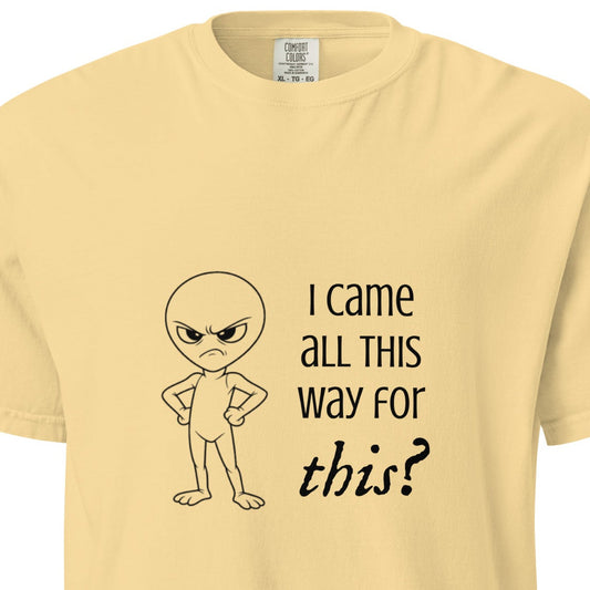 Unisex garment-dyed heavyweight T-shirt featuring an angry alien graphic in butter color, from Wayward.biz.