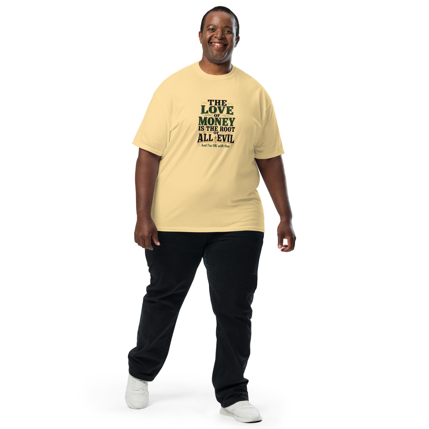 Unisex garment-dyed heavyweight T-shirt with "The love of money is the root of all evil and I'm OK with that" text in white on butter color.