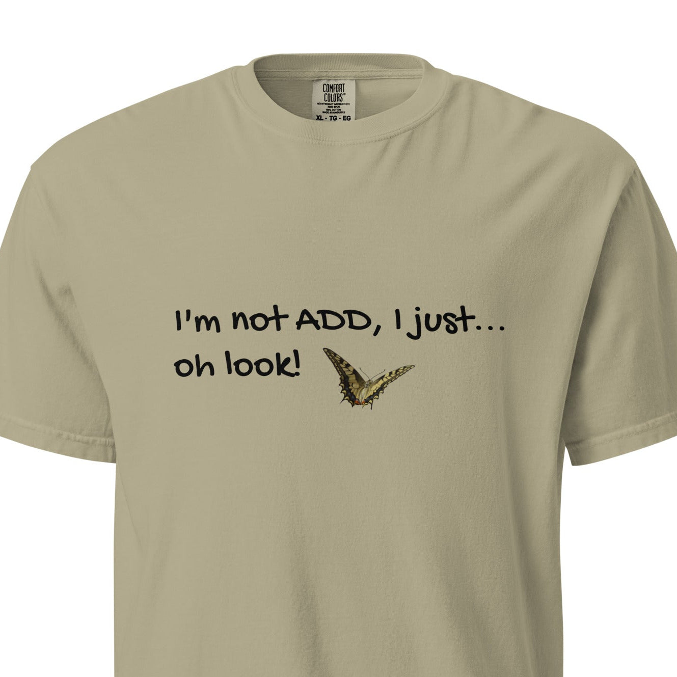 Unisex garment-dyed heavyweight khaki T-shirt from wayward.biz with a front view showing a relaxed fit and soft, durable fabric.