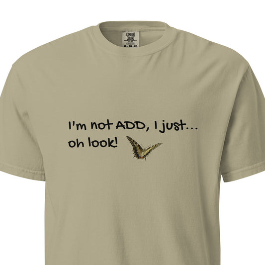 Unisex garment-dyed heavyweight khaki T-shirt from wayward.biz with a front view showing a relaxed fit and soft, durable fabric.
