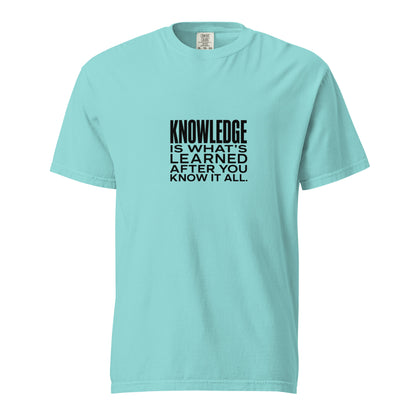 Unisex garment-dyed heavyweight T-shirt in lagoon blue with "Knowledge is what's learned after you know it all" print, by wayward.biz.