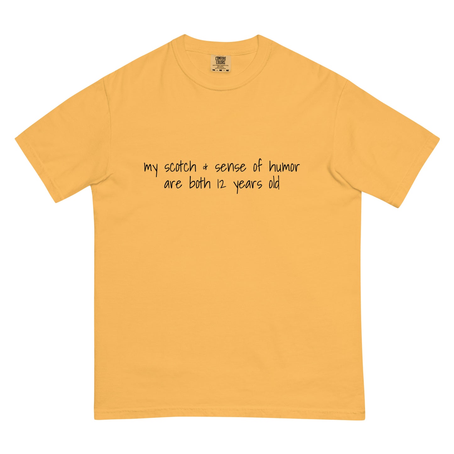 Unisex mustard heavyweight T-shirt with "My Scotch & Sense of Humor Are Both 12 Years Old" graphic by Wayward.biz, front view.