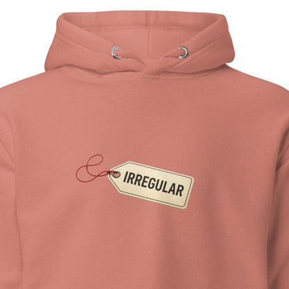 Unisex dusty rose hoodie with irregular design, front view, casual pullover style, by wayward.biz.