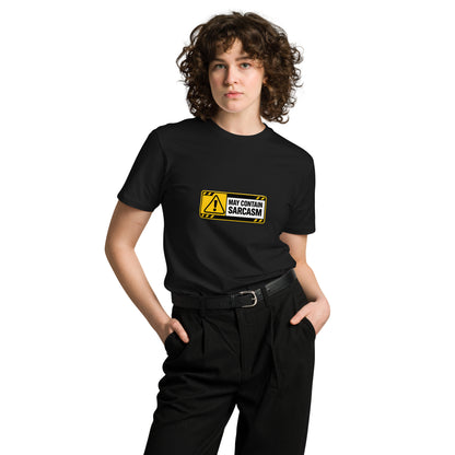 Unisex black premium T-shirt with "May Contain Sarcasm" text on front, casual style, from wayward.biz.