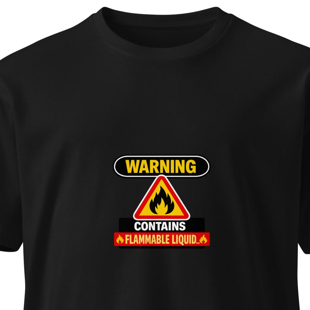 Unisex black premium T-shirt with warning "Contains Flammable Liquid" printed on the front, by wayward.biz.