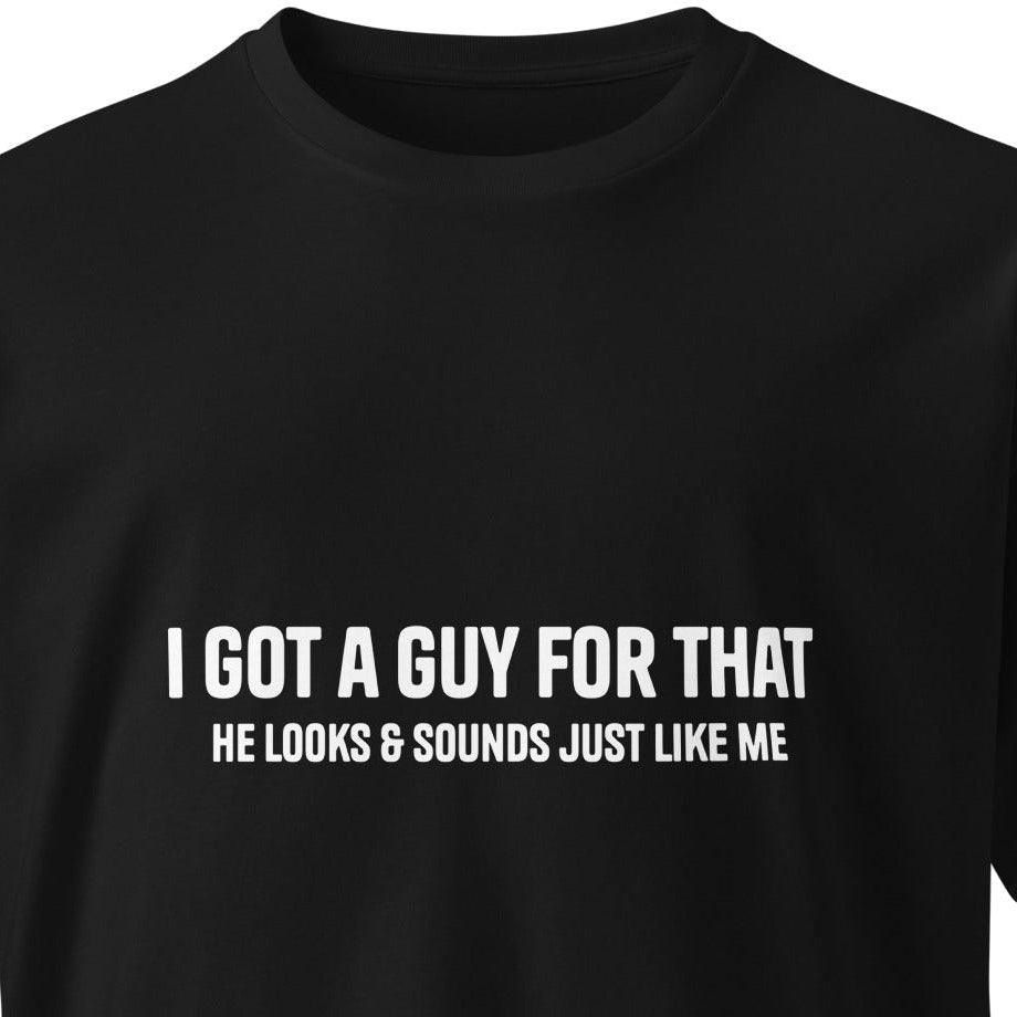 Unisex black premium T-shirt with "I got a guy for that" print, from wayward.biz, front view showing casual fit and design.