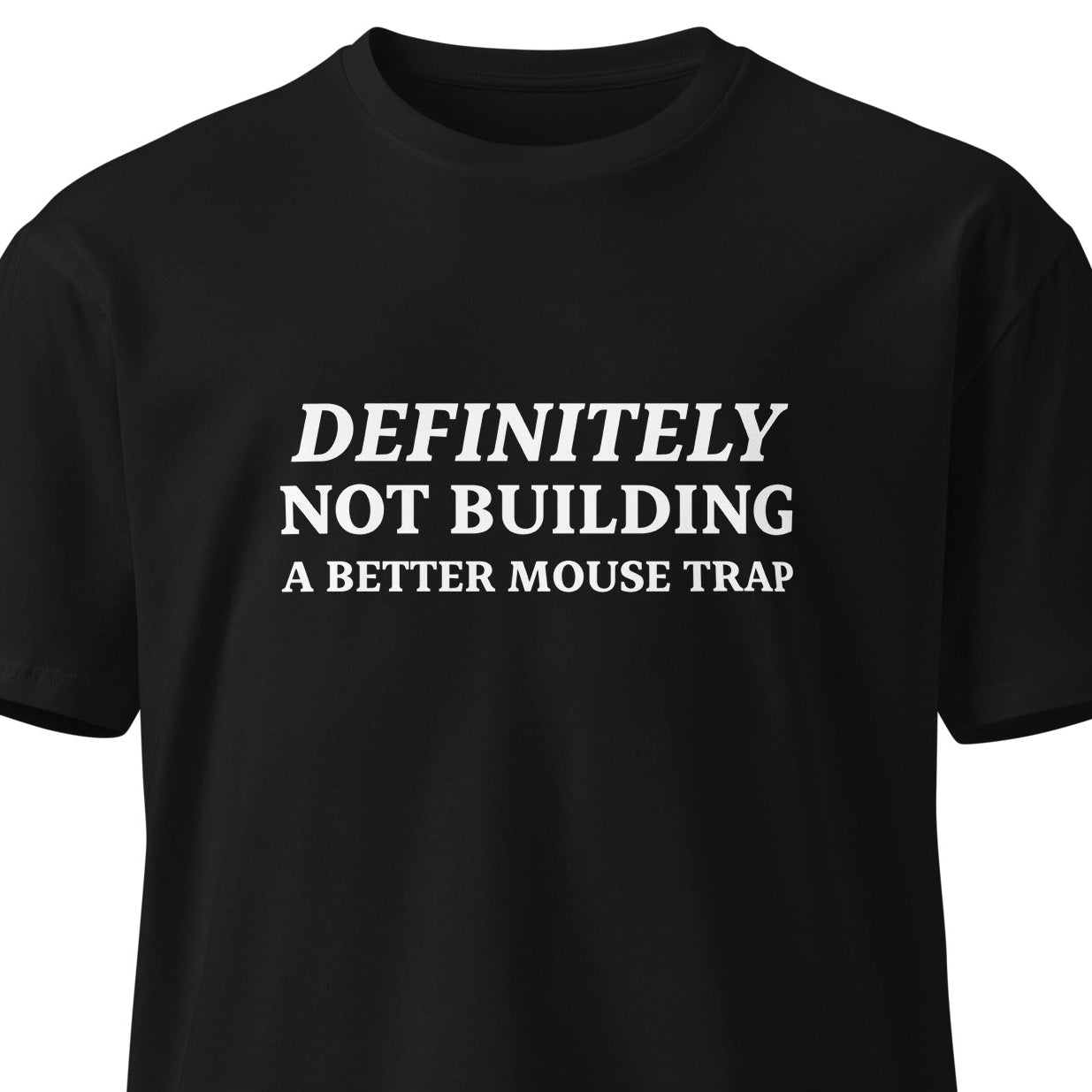 Black unisex premium T-shirt featuring the "Definitely not building a better mouse trap" design from wayward.biz.