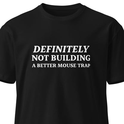 Black unisex premium T-shirt featuring the "Definitely not building a better mouse trap" design from wayward.biz.