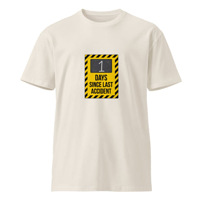 Unisex premium T-shirt from wayward.biz with "1 Day Since Last Accident" text and bone graphic on front.