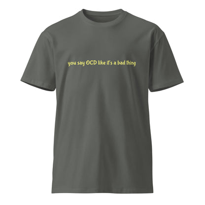 Unisex charcoal premium T-shirt with "You say OCD like it's a bad thing" slogan, featuring a comfortable fit and casual style.