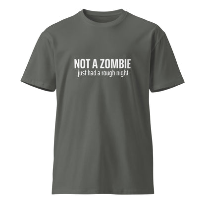 Unisex charcoal premium T-shirt with "Not a Zombie just had a rough night" printed front, by wayward.biz.