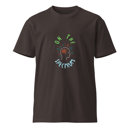 Unisex premium dark T-shirt with "On the Spectrum" print, made by wayward.biz, front view showing design and fit.