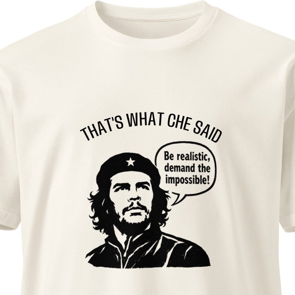 Unisex premium ecru T-shirt with "That's What Che Said" slogan, featuring a casual fit and soft cotton fabric.