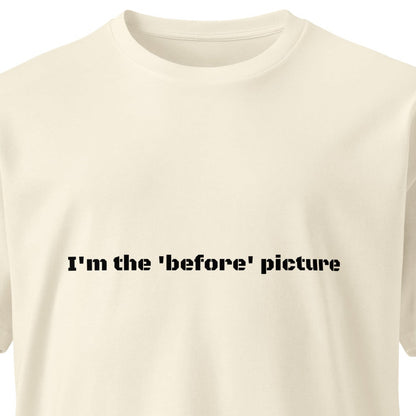Unisex light premium T-shirt by wayward.biz with "I'm the 'before' picture" text, natural color, front view.