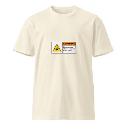 Unisex natural-colored premium T-shirt with "Contents Under Pressure Do Not Irritate" printed on front, from wayward.biz.