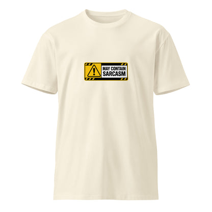 Unisex premium T-shirt with "May Contain Sarcasm" print, natural color, front view, from wayward.biz.