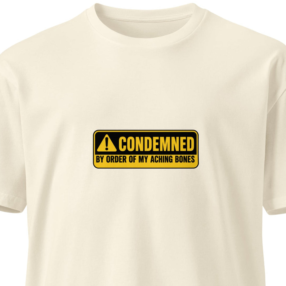 Unisex premium T-shirt with "Condemned by Order of My Aching Bones" design, natural front view, by wayward.biz