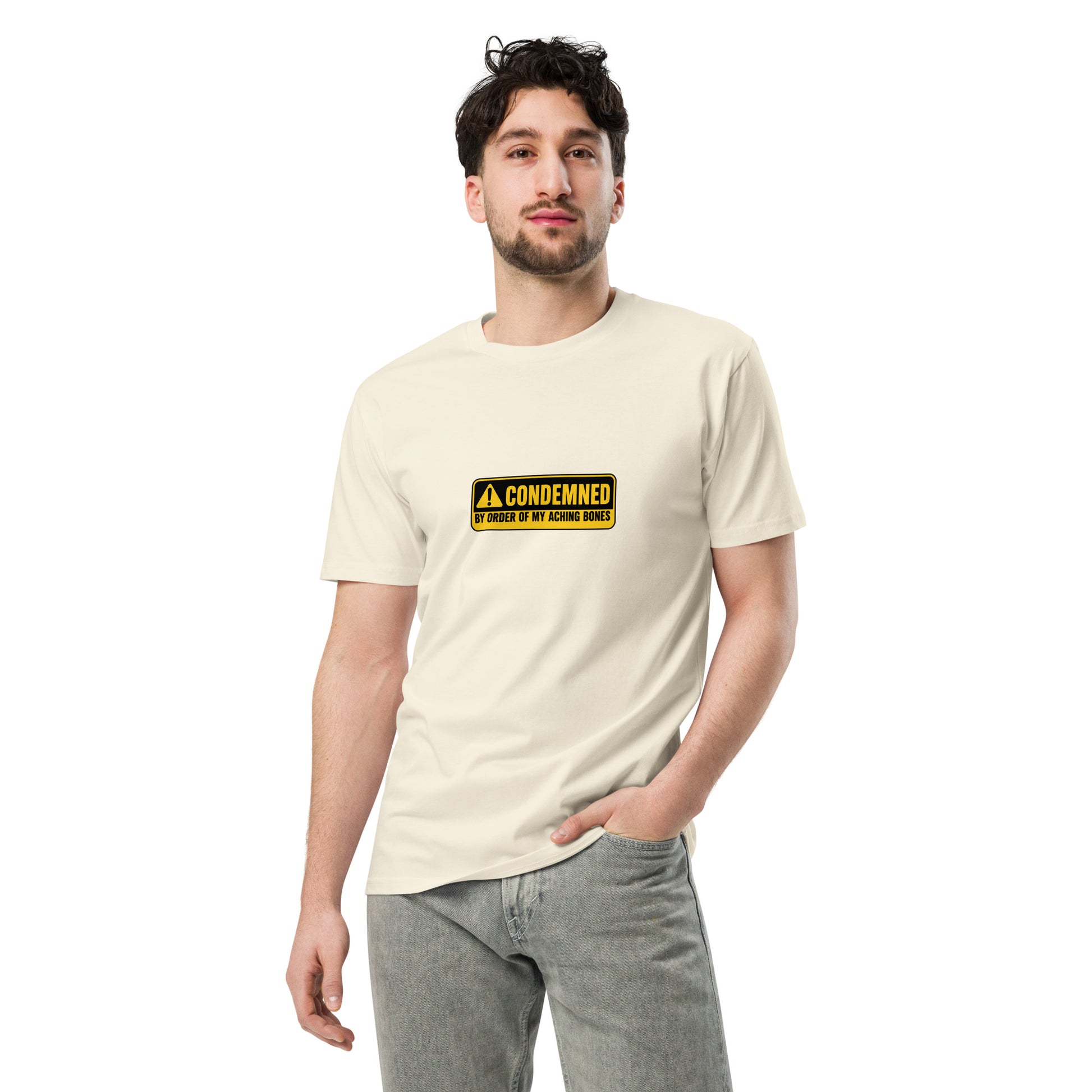 Unisex premium T-shirt by wayward.biz featuring a natural front design with "Condemned by Order of My Aching Bones" text.