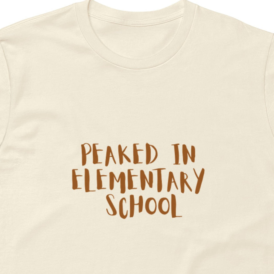 Unisex Peaked in Elementary School premium light t-shirt by wayward.biz, natural front view showing soft fabric and classic fit.