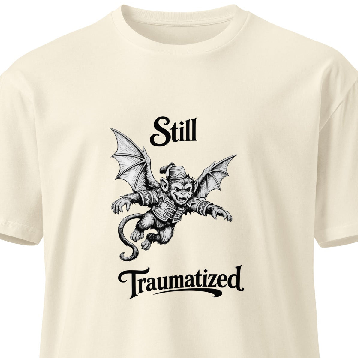 Unisex premium light t-shirt featuring a natural front design inspired by Still Traumatized by Flying Monkeys by wayward.biz