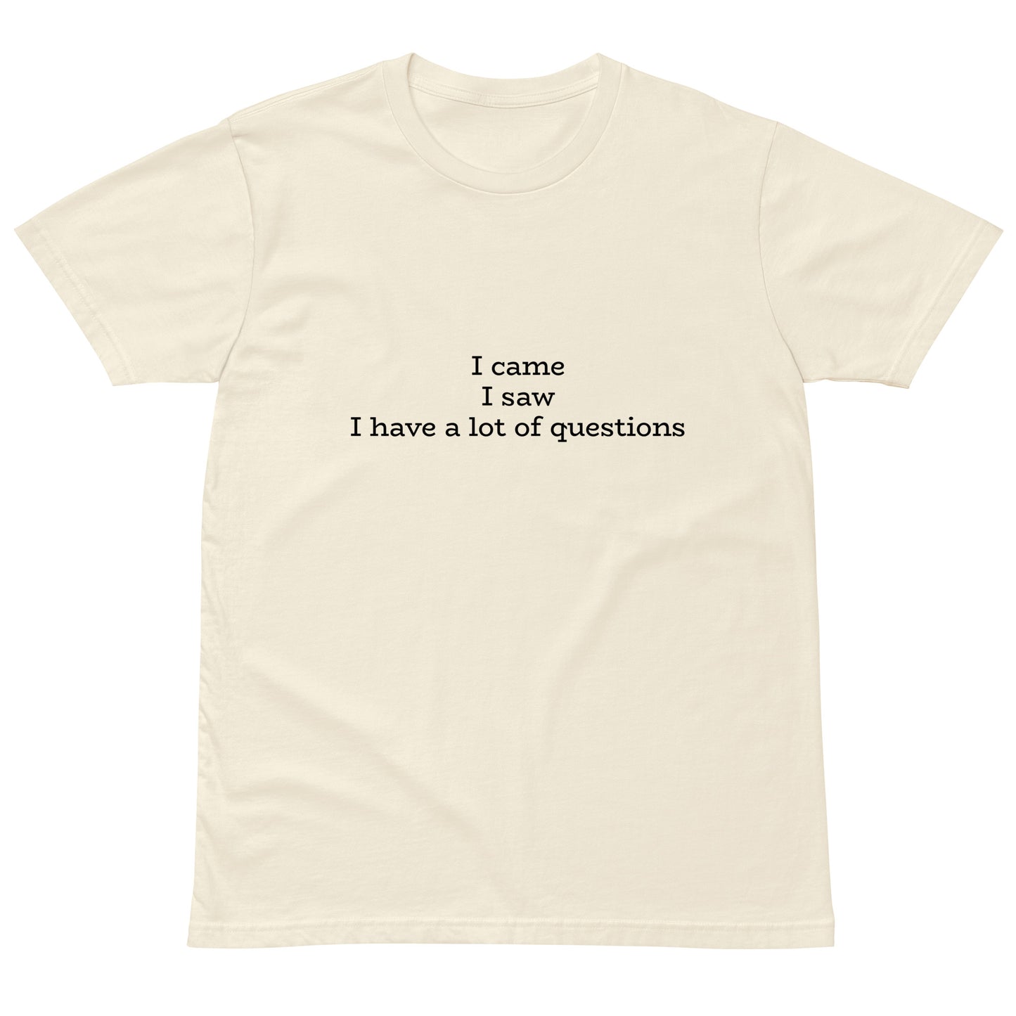 Unisex premium light t-shirt with "I came. I saw. I have a lot of questions" print, natural color, front view, from wayward.biz.