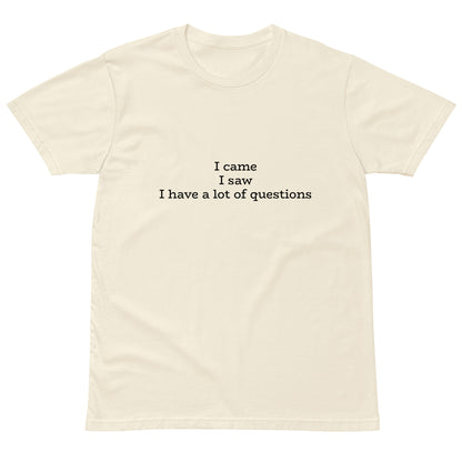 Unisex premium light t-shirt with "I came. I saw. I have a lot of questions" print, natural color, front view, from wayward.biz.