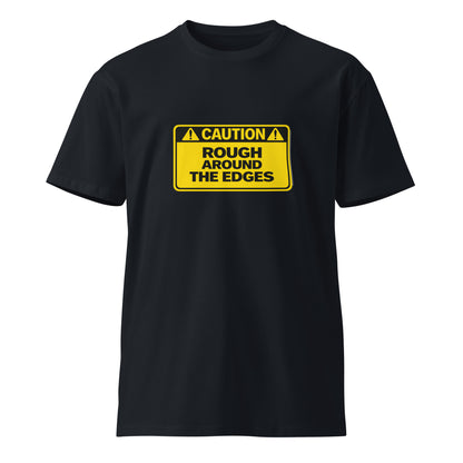 Unisex navy premium T-shirt with "Caution Rough Around the Edges" graphic from wayward.biz, front view.