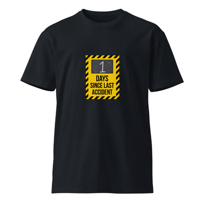 Unisex navy premium T-shirt with "1 Day Since Last Accident" slogan on front, from wayward.biz.